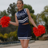Teen cheerleader Dani Daniels pulls up her skirt to toy her gloryhole
