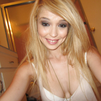 Stunning blonde babe Tiffany Fox stripping and exposing her sweet pussy