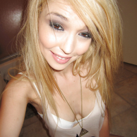 Lovely girlfriend Tiffany Fox prefers fingering her hard nipples