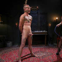 Bella Rossi takes control over tied up male slave