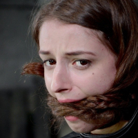 Willow Hayes pigtails brunette babe is bound in leather straightjacket
