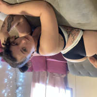 Tattooed chick Dakota Marr puts her curvy figure on display