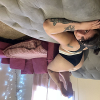 Tattooed chick Dakota Marr puts her curvy figure on display