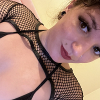 Tattooed chick Dakota Marr puts her curvy figure on display