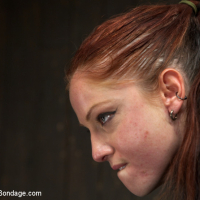 Tricia Oaks on high heels metal bound in dungeon