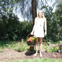 Solo girl Harley Jade inserting vegetables into pussy in the woods
