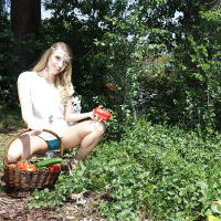 Solo girl Harley Jade inserting vegetables into pussy in the woods