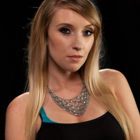 Harley Jade busty blonde is metal bound and spanked by The Pope