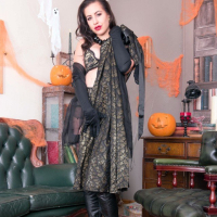 Gorgeous milf Tindra Frost enjoys teasing in sexy nylon outfit and boots