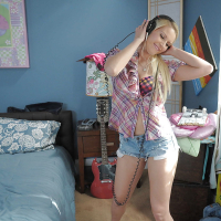 Horny babe Vanessa Cage stripping and teasing her cunt under her shorts