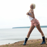 Gorgeous blonde babe Olivia Devine gets naughty and naked on a beach