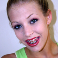 Petite blond Leah Luv gets nasty with strawberries