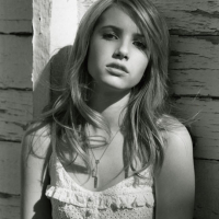 Emma exposes her bobbies in fantasy photos