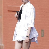 The beautiful Anne Hathaway with sexy legs