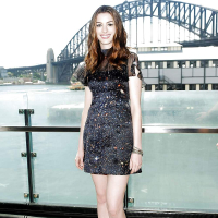 The beautiful Anne Hathaway with sexy legs