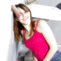 Slender teenager Nickey Huntsman is licking dick through the hole