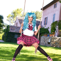 Cosplaying hottie Lucie Wilde shows off her massive hooters outside