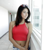 Slender Latina babe Jade Jantzen is undressing her tight jeans shorts