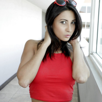 Slender Latina babe Jade Jantzen is undressing her tight jeans shorts