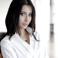 Brunette babe Jade Jantzen posing fully clothed in white blouse and skirt