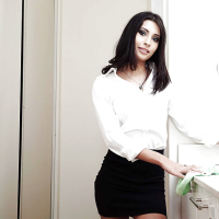 Brunette babe Jade Jantzen posing fully clothed in white blouse and skirt