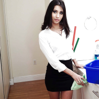 Brunette babe Jade Jantzen posing fully clothed in white blouse and skirt