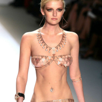 Lydia Hearst showing her nice tits and in black stockings