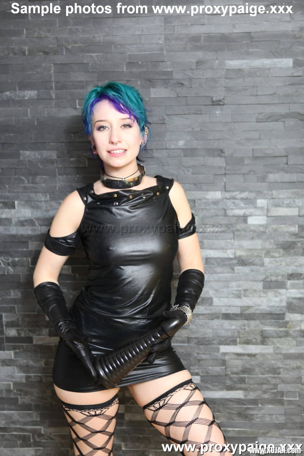 Proxy Paige squats and inserts long cone dildo deep into her asshole in this ana - Photo #965634