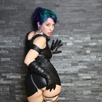 Proxy Paige squats and inserts long cone dildo deep into her asshole in this ana