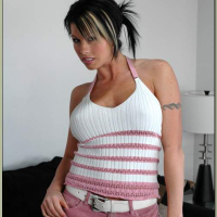 Arousing babe Brooke Haven exposing round boobs and strips from panties