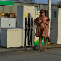 Busty Nude Chrissy goes for a naturist walk wearing only a fur coat