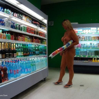 Nude Chrissy walking around a Nudist Resort