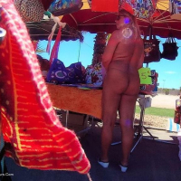 Nude Chrissy walking around a Nudist Resort