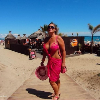 Nude Chrissy walking around a Nudist Resort