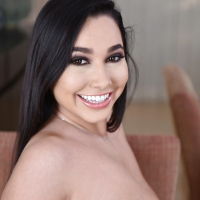 Dark haired model Karlee Grey unveiling big tits and trimmed pussy in barefeet