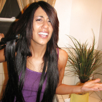 Amateur Latina Lyla Storm is stripping to spread her thighs