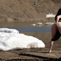 Pictures of XXX Mina fingering herself on a beach
