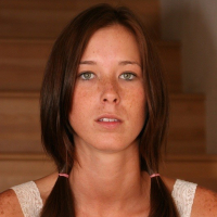 Brooke in a blue skirt on the stairs