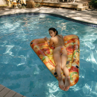 Carmen Rae having fun in the pool on a summer day