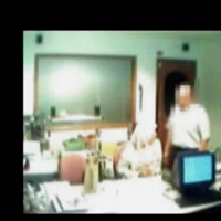 Veiled Arab secretary blowing white manager
