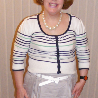 Slutty secretary in tights and white stilettos