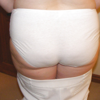 Slutty secretary in white knickers and platforms