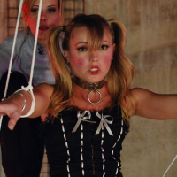 Naughty Trisha Uptown is a strung up doll