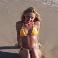 Trisha Uptown Flashes her pussy and tits on the beach
