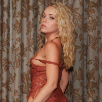 Pictures of teen Trisha Uptown teasing in a dress