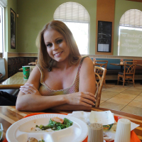 Big tits Latina babe Nikki Delano demonstrates her legs in shorts