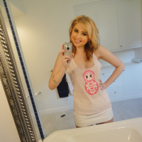 Blonde babe Molly Bennett does sexy selfshots in the bathroom