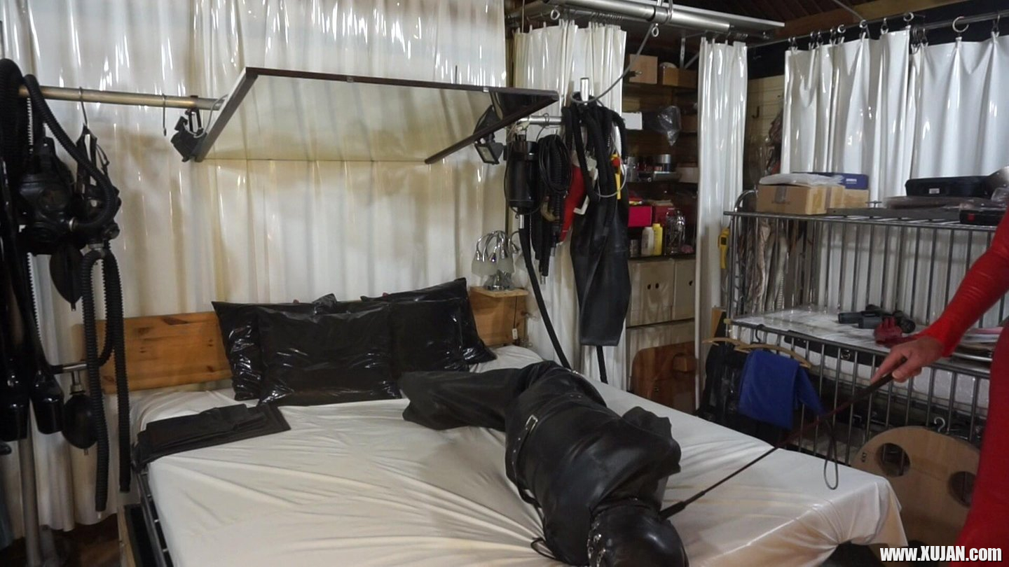 Hot mistress wearing red latex dress in BDSM scene - Photo #1035734