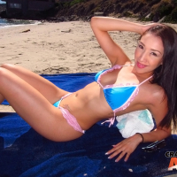 Amateur asian sweetie Vicki Chase posing on the beach in a bikini