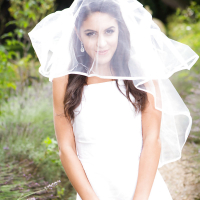 Latina babe Carolina Abril caught in candid outdoors wedding dress photos